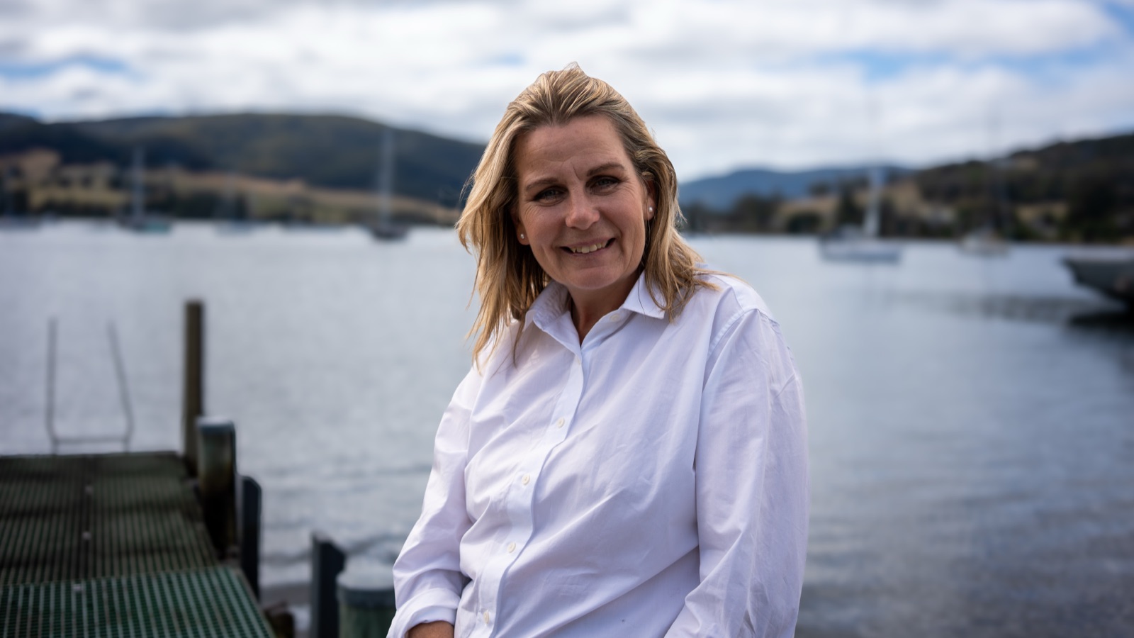 Annica Larsdotter by the dock — gentle, evidence-informed neck care